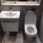 sink with open toilet in Tilehurst, Reading