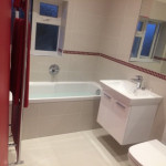 red and white bathroom with full bath in Tilehurst, Reading