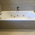 bath with water jets in Tilehurst, Reading