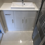 white sink with floor to ceiling radiator in Tilehurst, Reading