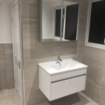 floating sink with mirror cabinet in Tilehurst, Reading