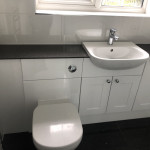 sink installation with black worktops in Tilehurst, Reading