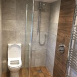 wooden effect toilet and shower enclosure in Tilehurst, Reading