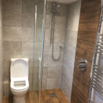 wooden effect toilet and shower enclosure in Tilehurst, Reading