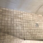 wet room with wooden effect tiles in Tilehurst, Reading